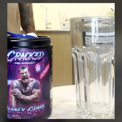 CRACK3D Gurney Grape tub open on a kitchen worktop with the scoop and a glass of water